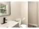 Bathroom features a modern vanity, a neutral color scheme, and updated fixtures at 835 Carrington Dr, Charlotte, NC 28214