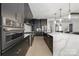 Beautiful kitchen with stainless steel appliances and a large island at 10119 Laurier Ln, Huntersville, NC 28078