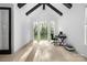 Bright office space with beamed ceiling and backyard view at 10119 Laurier Ln, Huntersville, NC 28078