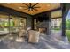 Cozy outdoor patio with a fireplace and comfortable seating area at 10119 Laurier Ln, Huntersville, NC 28078