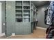 Custom walk-in closet with ample shelving and drawer space at 10119 Laurier Ln, Huntersville, NC 28078