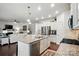 Modern kitchen with a granite island, stainless steel appliances, and an open layout at 10120 Berkeley Castle Dr, Charlotte, NC 28273