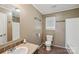 Bathroom featuring wood floors, toilet, sink, and shower at 1069 Heather Glen Dr, Catawba, NC 28609