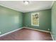 Bedroom with a window and hardwood floors at 1069 Heather Glen Dr, Catawba, NC 28609