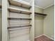 Spacious closet with wood shelving for optimal storage and organization at 1069 Heather Glen Dr, Catawba, NC 28609