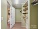 Spacious walk-in closet with an attached bathroom at 1069 Heather Glen Dr, Catawba, NC 28609