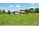 Sprawling front yard and exterior of this ranch home with wooden deck and well-maintained landscaping at 1069 Heather Glen Dr, Catawba, NC 28609
