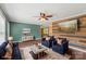 Stylish living room features hardwood floors, modern furniture, and a rustic wood accent wall at 1069 Heather Glen Dr, Catawba, NC 28609