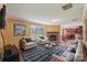 Cozy living room featuring plush seating, fireplace, and an open layout to the kitchen at 1069 Heather Glen Dr, Catawba, NC 28609