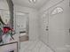 Inviting foyer featuring tile floors, wainscoting and a bedroom view at 115 Fox Run Dr, Fort Mill, SC 29715