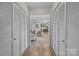 Hallway entrance with storage closets leading to the main living spaces at 115 Fox Run Dr, Fort Mill, SC 29715