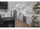 Remodeled kitchen with white cabinets, stainless steel appliances, and access to laundry at 115 Fox Run Dr, Fort Mill, SC 29715