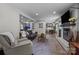 Spacious living room with fireplace and an open floorplan view to the dining room at 115 Fox Run Dr, Fort Mill, SC 29715