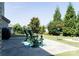 Backyard with chairs and mature landscaping at 1156 Mckee Farm Ln, Belmont, NC 28012