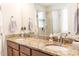 Elegant bathroom vanity with double sinks, granite countertops, and modern fixtures at 1156 Mckee Farm Ln, Belmont, NC 28012