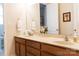 Bathroom with double sinks, vanity with granite countertops, and a large mirror at 1156 Mckee Farm Ln, Belmont, NC 28012