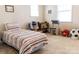 room with toys, rocking chair, bed and lots of natural light at 1156 Mckee Farm Ln, Belmont, NC 28012