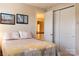 Comfortable bedroom with a decorative bedspread, closet and inviting atmosphere at 1156 Mckee Farm Ln, Belmont, NC 28012