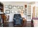 Cozy living area with comfortable seating, built-in bookshelves, and natural light at 1156 Mckee Farm Ln, Belmont, NC 28012