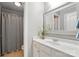 Cozy bathroom features a shower-tub combo and ample vanity space at 11724 Easthampton Cir, Charlotte, NC 28277