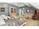 Spacious bedroom featuring a sitting area and ample natural light at 11724 Easthampton Cir, Charlotte, NC 28277