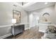 Spacious foyer featuring hardwood floors and a decorative mirror at 11724 Easthampton Cir, Charlotte, NC 28277