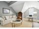Inviting living room with a comfortable sofa, unique chair, and stylish decor at 11724 Easthampton Cir, Charlotte, NC 28277
