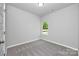 Cozy bedroom with a large window that offers lots of natural light and plush carpet flooring at 1225 Langston Ln, Salisbury, NC 28144