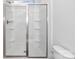 Modern walk-in shower features sleek glass doors and built-in shelving for convenience at 1225 Langston Ln, Salisbury, NC 28144