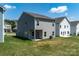 Exterior view of the backyard and home showcasing the yard at 1237 Langston Ln, Salisbury, NC 28144