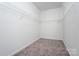 Walk-in closet with wire shelving and neutral carpet at 1237 Langston Ln, Salisbury, NC 28144