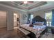 Luxurious main bedroom with a tray ceiling, ensuite bathroom, and a spacious layout, perfect for relaxation and comfort at 1242 Langston Ln, Salisbury, NC 28144