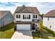 Charming two-story home with a two-car garage and a welcoming front porch, set in a well-maintained community at 1248 Langston Ln, Salisbury, NC 28144