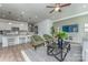 Open-concept living room featuring modern furnishings, stylish decor, and seamless flow to the kitchen area at 1248 Langston Ln, Salisbury, NC 28144