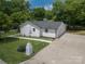 Aerial shot of updated home features fresh paint, new roof and landscaping at 132 Kennedy Ave, Kannapolis, NC 28083