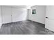 Clean, bright bedroom featuring a window and modern, minimalist design at 132 Kennedy Ave, Kannapolis, NC 28083