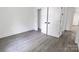 Bedroom features vinyl plank flooring and double closets at 132 Kennedy Ave, Kannapolis, NC 28083