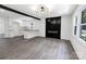 Bright and airy living room with a stylish fireplace and open view to the modern kitchen at 132 Kennedy Ave, Kannapolis, NC 28083