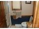 Cozy bathroom featuring a shower and toilet, with classic towel rack and mirror at 1325 Lee Lynn Dr # 7 Part Of 6, Albemarle, NC 28001