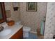 Quaint bathroom with floral wallpaper and vintage fixtures at 1325 Lee Lynn Dr # 7 Part Of 6, Albemarle, NC 28001