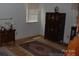 Serene bedroom with classic wood furniture and large windows at 1325 Lee Lynn Dr # 7 Part Of 6, Albemarle, NC 28001