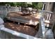 Spacious wood deck with outdoor seating and white railings at 1325 Lee Lynn Dr # 7 Part Of 6, Albemarle, NC 28001