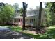 Charming two story home with a welcoming porch, trees, and an American flag at 1325 Lee Lynn Dr # 7 Part Of 6, Albemarle, NC 28001
