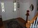 The foyer features hardwood floors, white front door with stained glass, and closet storage at 1325 Lee Lynn Dr # 7 Part Of 6, Albemarle, NC 28001