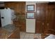 Functional kitchen features a spacious countertop, wood cabinets, and modern appliances at 1325 Lee Lynn Dr # 7 Part Of 6, Albemarle, NC 28001