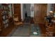 A comfortable living room featuring hardwood floors, rocking chair, glass-topped coffee table, and wooden decor at 1325 Lee Lynn Dr # 7 Part Of 6, Albemarle, NC 28001