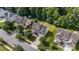 An aerial view of a neighborhood showcasing tree-lined streets and well-maintained yards at 137 Branchview Dr, Mooresville, NC 28115