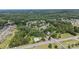 Panoramic aerial view of a community surrounded by lush greenery and mature trees at 137 Branchview Dr, Mooresville, NC 28115