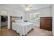 Cozy bedroom with natural light, neutral walls and a comfortable bed at 137 Branchview Dr, Mooresville, NC 28115