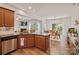Open kitchen featuring stainless steel appliances and hardwood flooring at 137 Branchview Dr, Mooresville, NC 28115